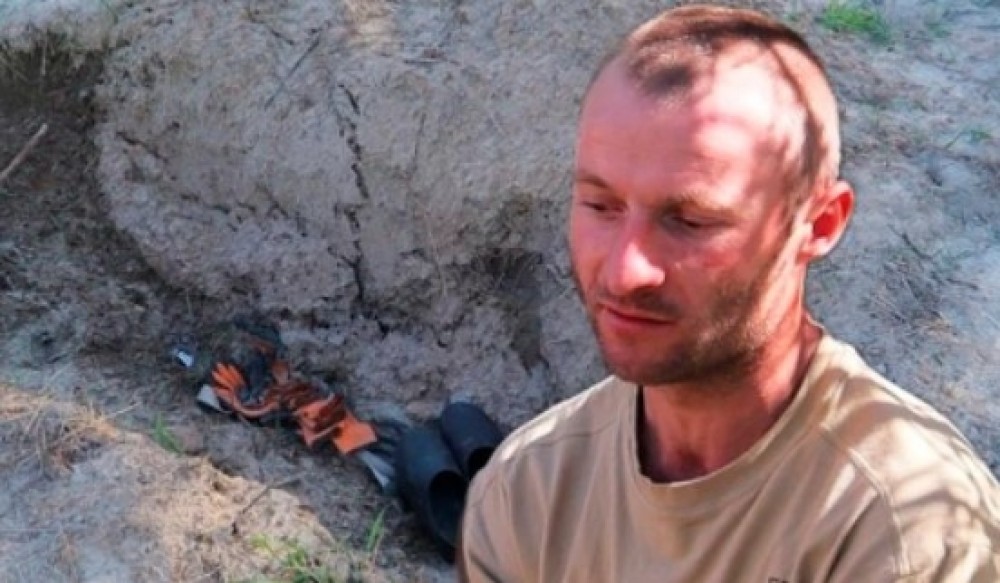 TERIFIANT // Un ucrainean îngropat de viu alături de frații săi împușcați de ruși